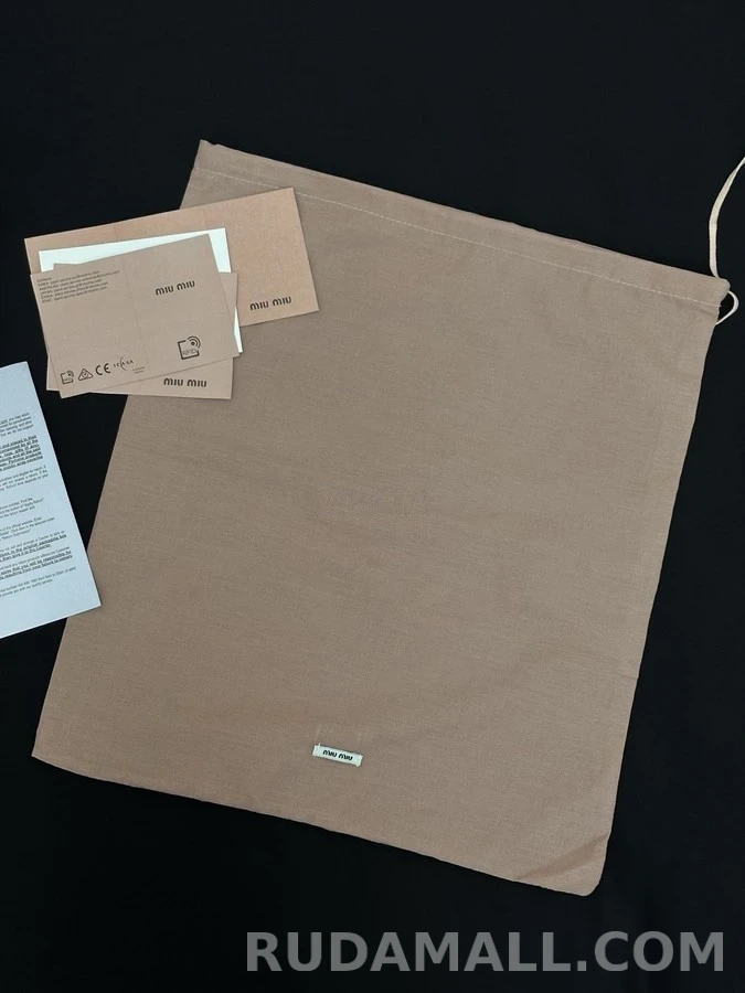 미우미우 미우미우 라운드 토 엠보싱 풀탭 워크웨어 부츠 상세 이미지